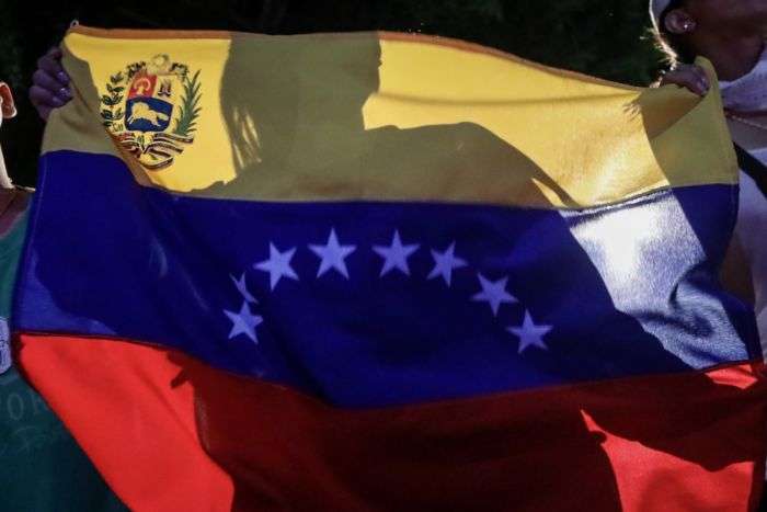 Migrantes venezolano con TPS