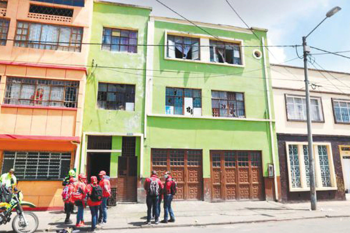Vista de la fachada de la 'casa de los masajes', un centro de tortura ubicado en la localidad de Santa Fe, en el centro de Bogotá. SECRETARÍA DE SEGURIDAD